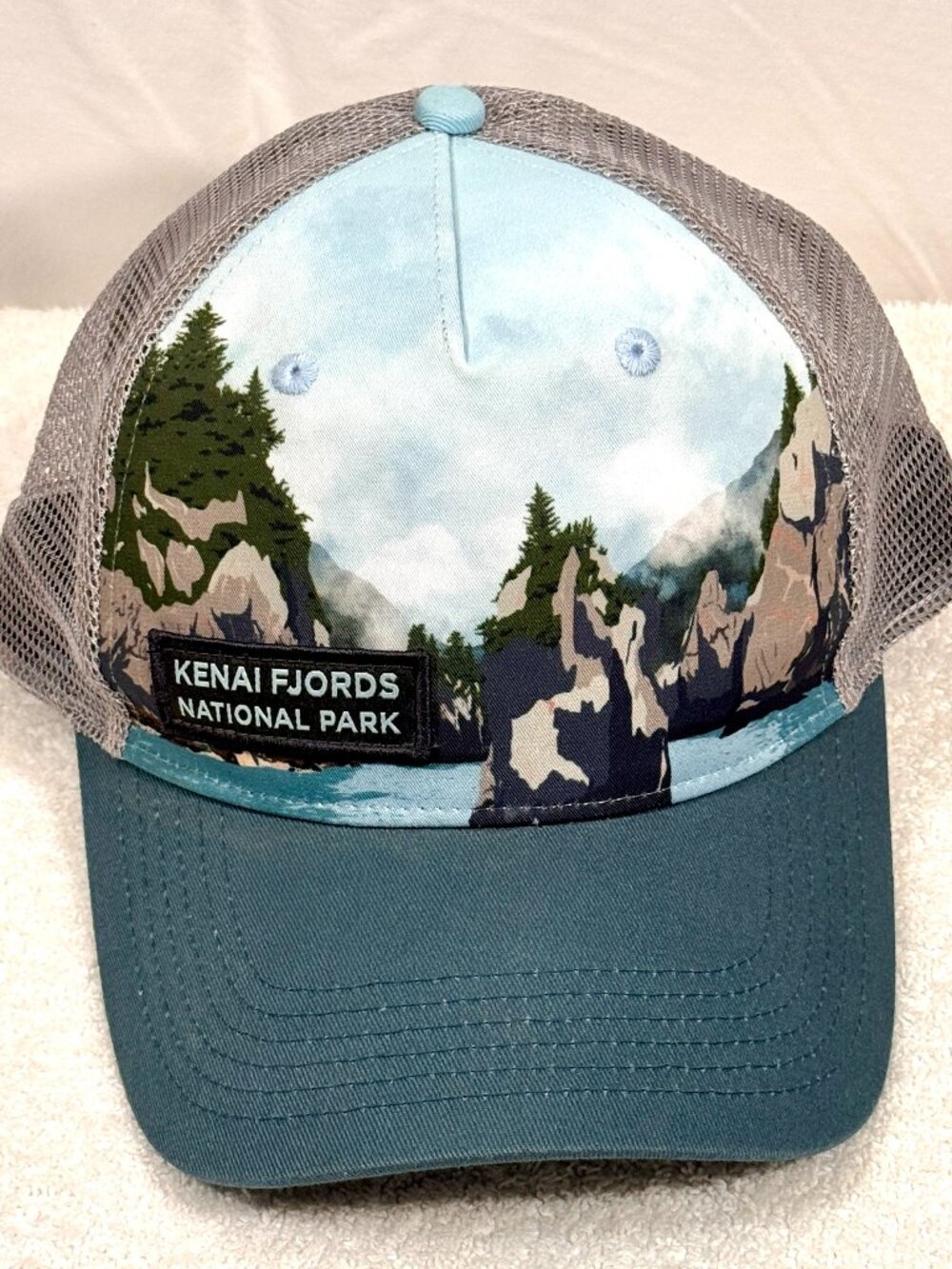 Locale Kenai Fjords National Park Trucker Hat